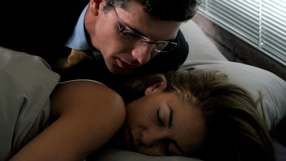 Homme et femme au lit