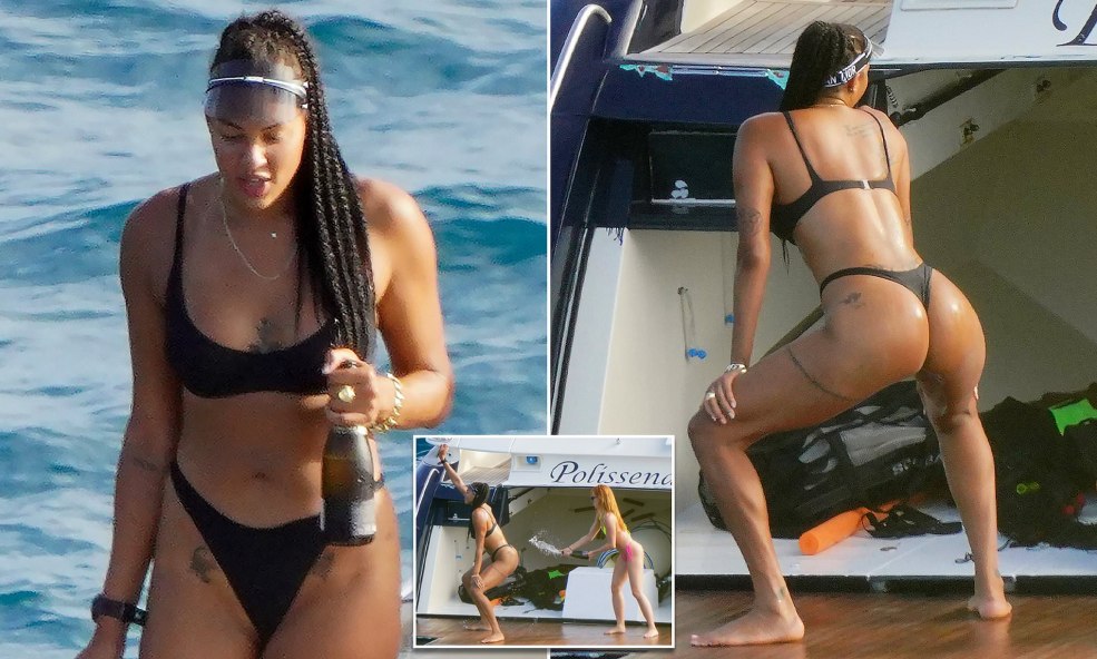 Liz cambré dans un maillot de bain