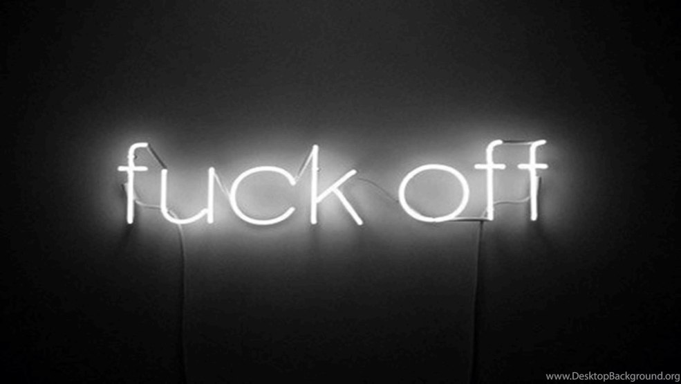 Inscriptions néon sur fond noir